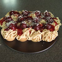 Spaghetti And Meatballs Cupcakes Cupcakes topped with buttercream "Spaghetti", Raspberry preserve "Sauce", ferrero rocher "Meatballs", and...