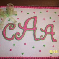 College Graduation I did this cake for a client graduating from college. She wantedher monogram on the cake. All buttercream w/bow made from ribbon.