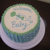 Baby Cake This baby shower cake is yellow cake, torted and filled with hazlenut mousse, and iced and decorated in Italian meringue buttercream. I...