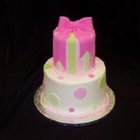 Baby Girl Mini tiered cake iced in buttercream with fondant accents