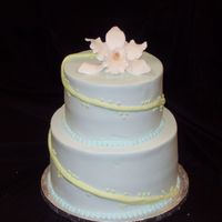 Orchid Iced in buttercream with gumpaste orchid