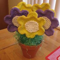 Cookie Bouquet My first cookie bouquet. I mailed it to my sister for her birthday! Sugar cookies with royal icing.