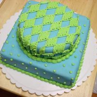 Blue & Green Fun This was my first stacked cake. I had some fondant left over in blue from my Wilton course 3 package cake and decided to make this cake....