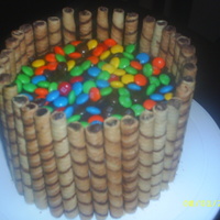 Mock Birthday Cake This is my first cake made with pirouettes. I wanted to see how it would look. It's banana cake with strawberry/banana buttercream...