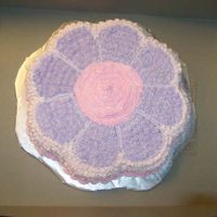 Jaycee's Birthday This is another I did a while back. Used Wilton's flower pan. You can't tell very well from the pic, but there is edible glitter...