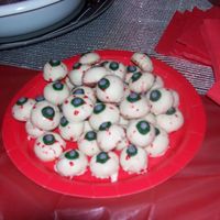 Monster Eyeballs I MADE THESE FOR MY DAUGHTERS HALLOWEEN COSTUME PARTY. THEY ARE PEANUT BUTTER BALLS WITH VANILLA CANDY COATING AND TINTED KARO SYRUP FOR...