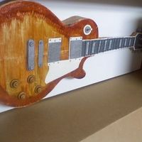 Another View Guitar Cake MY FIRST GUITAR CAKE - RED VELVET CAKE WITH CREAM CHEESE ICING AND MMF FONDANT.