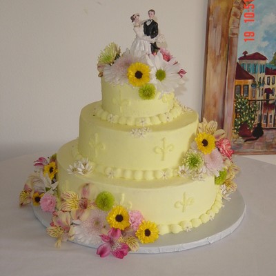 Yellow 3 Tier Round With Real Flowers