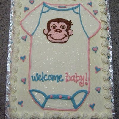 Pink And Blue Onesie Cake With Curious George