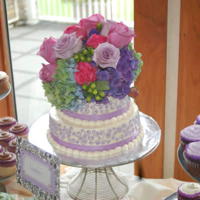 Purple Wedding Cake With Cupcakes