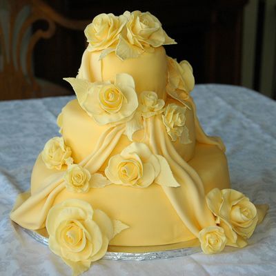 Fondant Wedding Cake In Buttercup Yellow With Roses
