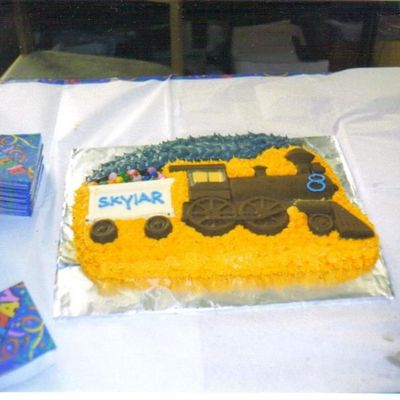 Chocolate Molded Train On Cake