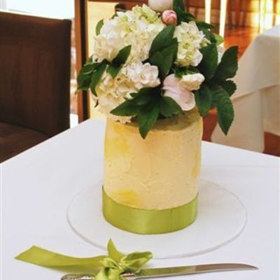 Stacked Column Wedding Cake With Buttercream And Fresh Flowers