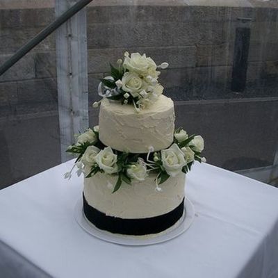 Stacked 2 Tier Cake With Textured Buttercream And Fresh Flowers