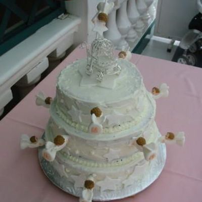 Angels Decorating Cake