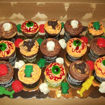 Halloween Cupcakes With Molded Chocolate Treats.