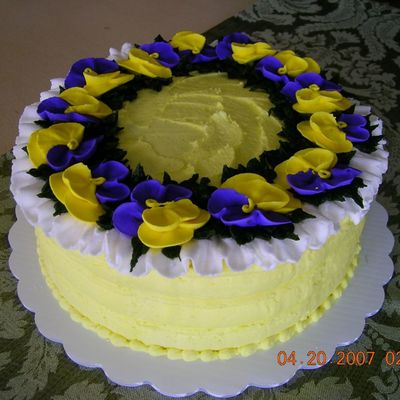 8" Rounds With Buttercream Icing. Pansies Are Royal Icing.