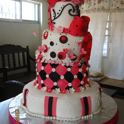 Whimsical Pink And Black Cake