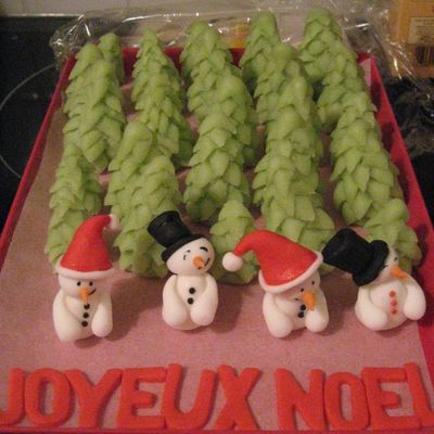 A Collection Of Little Snowmen In A Forest Of Christmas Trees !