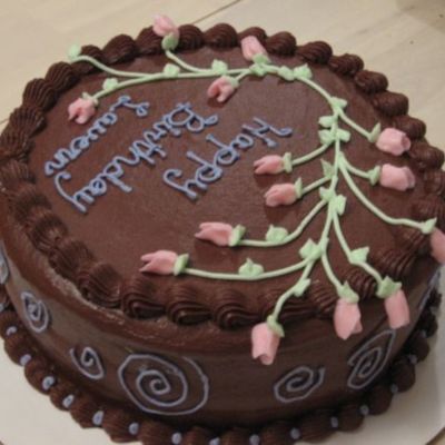 Round Chocolate Cake With Pink Flowers