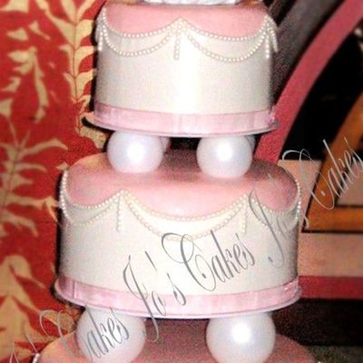 Pearl Swags On Pink And White Buttercream