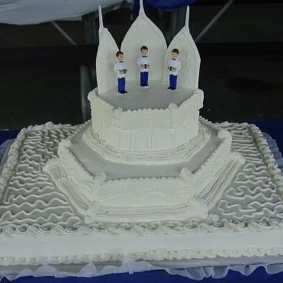 The Full Sheet Is Three Milk Cake And The Other Two Are Yellow Cake With Fresh Strawberries.the Walls Churh Were Made Of Fondant.