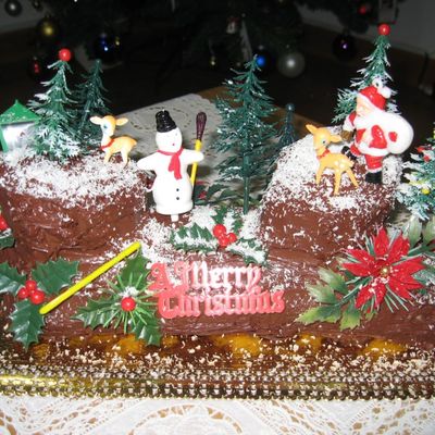 White Xmas Suiss Roll Stuffed Amp Covered With Ganache Sprinkled With Coconut