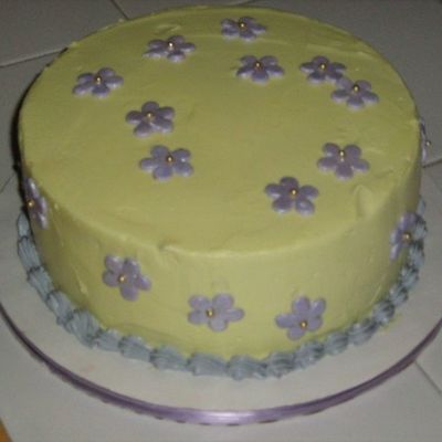 Yellow Cake With Purple Flowers