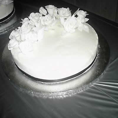 White Wedding Cake With Flowers