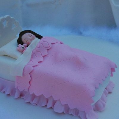 A Close Up Of The Sleeping Child From My Competition Cake