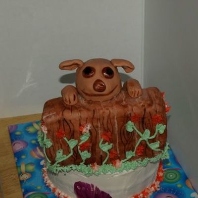 Puppy Peeking Over Fence