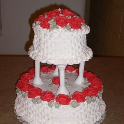 Two-Tiered Cake With Basketweave And Pink Roses