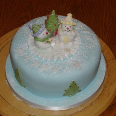 Singing Snowmen At Christmas Tree