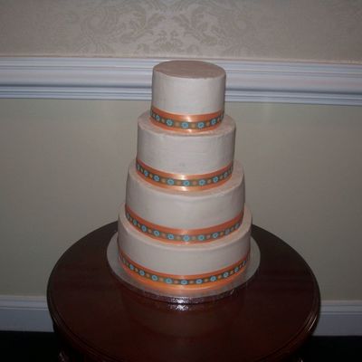 Wasc And Chocolate Cake With Buttercream And Ribbon For Decoration.