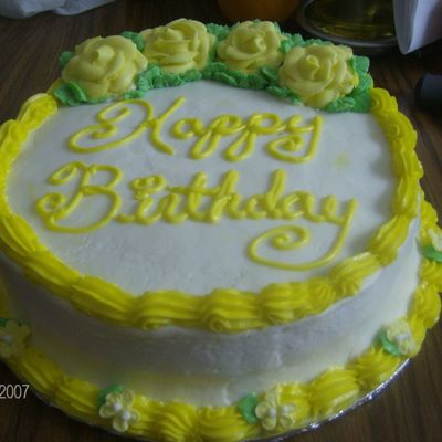 Yellow And White B-Day Cake