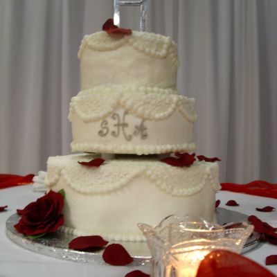 White Wedding Cake With Cornelli Lace