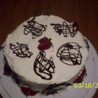 Angel Food Cake Filled With Strawberries/fresh Whipped Cream Icing