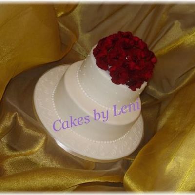 White Cake With Red Flowers