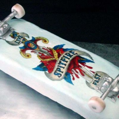 Gumpaste Wheels On Buttercream Iced Cake