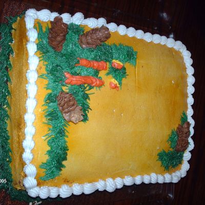 Christmas Cake With Candles And Pinecones