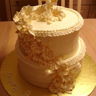 Buttercream With Royal Icing Flowers And Leaves