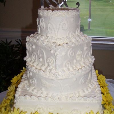 Square And Round Tiered White Wedding Cake