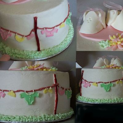 Cloths Line Cake With Fondant Booties On Top