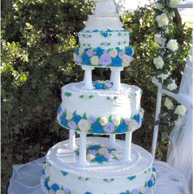 Blue, Purple And Cream Rose Wedding Cake