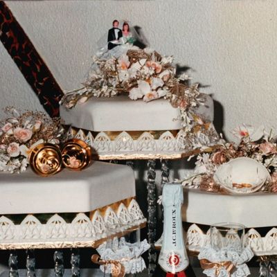 Fruit Cake Fondant Icing With Lace Pieces On The Sides All Around Sprays Made With Orchids Frangipanis And Roses