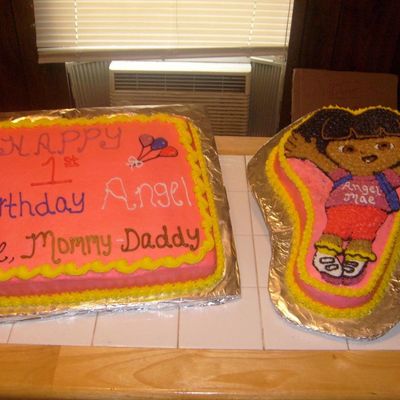 Dora With Sheet Cake To Match