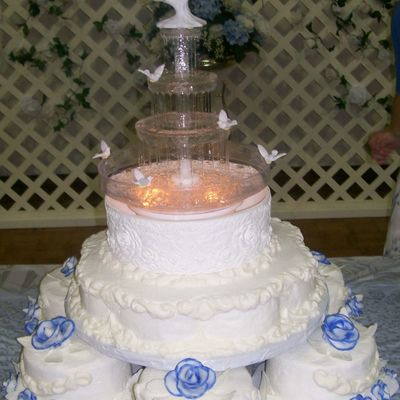 Blue Rose And Birds Wedding Cake