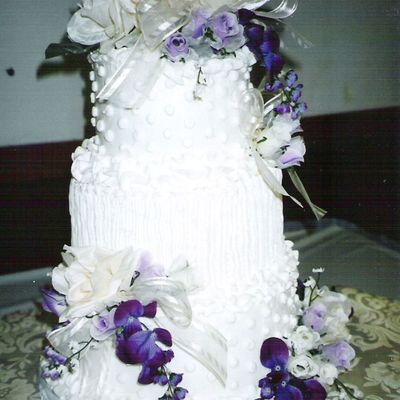 Wedding Cake With Purple Silk Flowers