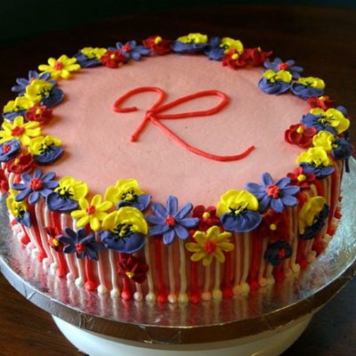Celebration Cake With Stripes And Flowers