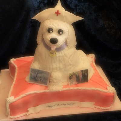 Nursing Puppy On A Pillow